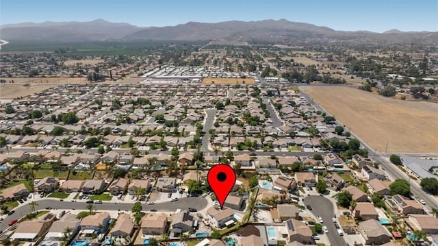 5444 Broderick Ct, Hemet, CA 92544 - aerial overview of property's location with a mountain backdrop and nearby suburban area