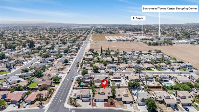 14225 Woodpark Dr, Moreno Valley, CA 92553 - aerial overview of property's location with nearby suburban area