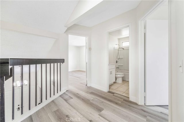14225 Woodpark Dr, Moreno Valley, CA 92553 - hall featuring wood finished floors and baseboards