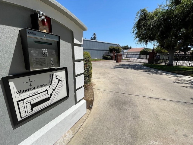 1935 W Santa Ana Ave, Fresno, CA 93705 - exterior view of driveway and stucco siding