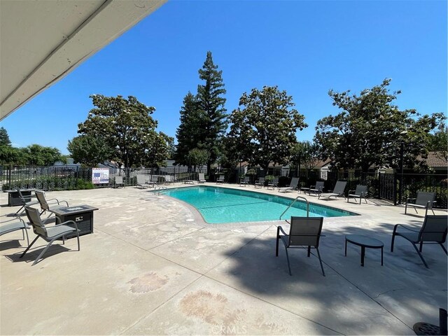 1935 W Santa Ana Ave, Fresno, CA 93705 - community pool featuring a patio