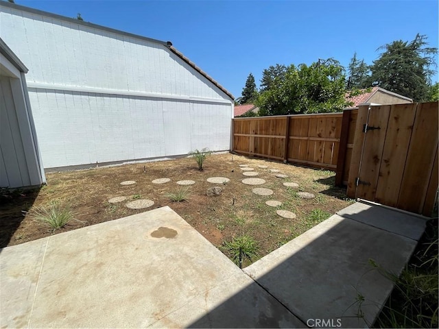 1935 W Santa Ana Ave, Fresno, CA 93705 - view of yard featuring a patio area and a gate