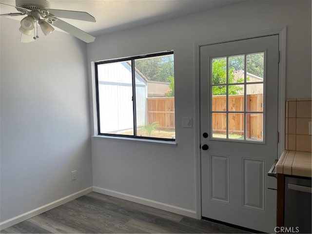1935 W Santa Ana Ave, Fresno, CA 93705 - doorway featuring dark wood finished floors and ceiling fan