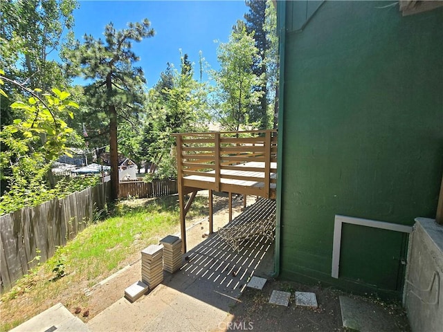 2445 Spring Dr, Running Springs, CA 92382 - fenced backyard featuring a deck