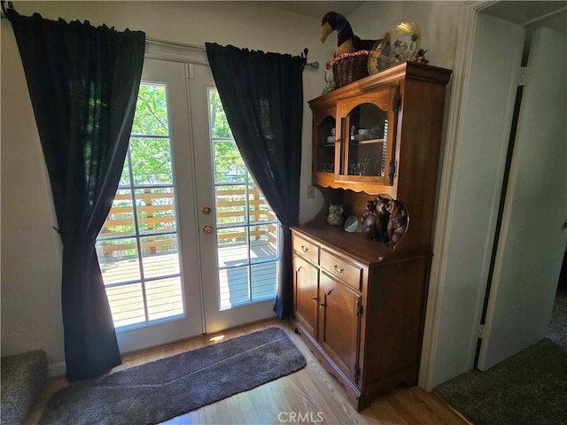 2445 Spring Dr, Running Springs, CA 92382 - doorway to outside with french doors and light wood-style floors