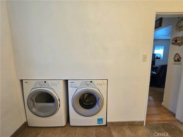 2445 Spring Dr, Running Springs, CA 92382 - laundry room featuring washer and clothes dryer and baseboards