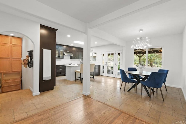 6038 Bradford St, San Diego, CA 92115 - dining room featuring recessed lighting, stone tile floors, a chandelier, and french doors