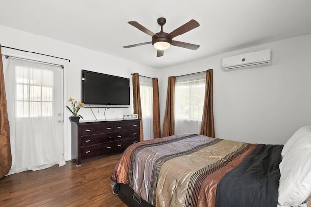 6038 Bradford St, San Diego, CA 92115 - bedroom featuring a wall mounted AC, multiple windows, dark wood-style flooring, and ceiling fan