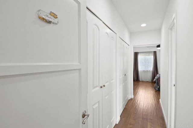 6038 Bradford St, San Diego, CA 92115 - corridor with dark wood-style floors and recessed lighting
