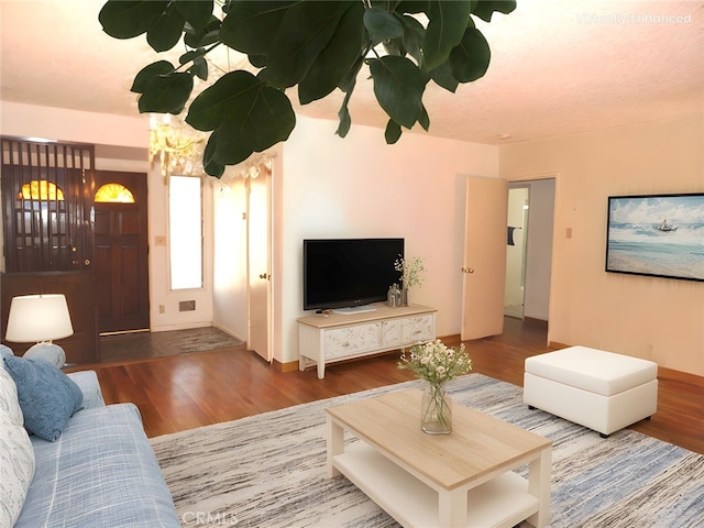 662 Kempton Ave, Monterey Park, CA 91755 - living area featuring wood finished floors and baseboards