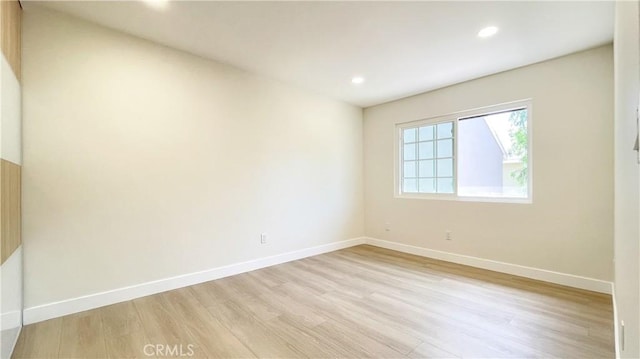 4 Skipper, Irvine, CA 92604 - unfurnished room with light wood finished floors and recessed lighting