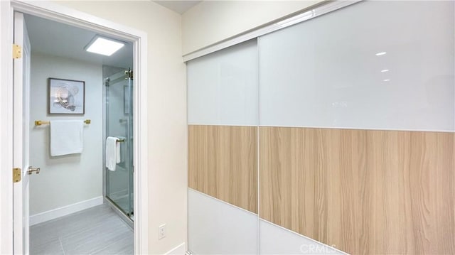 4 Skipper, Irvine, CA 92604 - full bathroom featuring baseboards and a shower with shower door