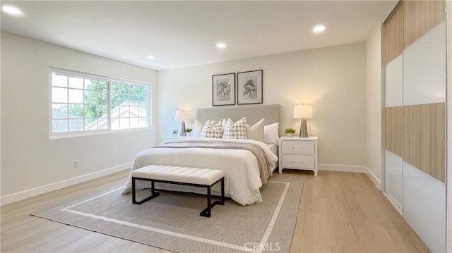 4 Skipper, Irvine, CA 92604 - bedroom with light wood-style flooring and recessed lighting