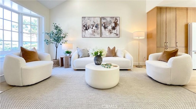 4 Skipper, Irvine, CA 92604 - living area featuring lofted ceiling and light carpet