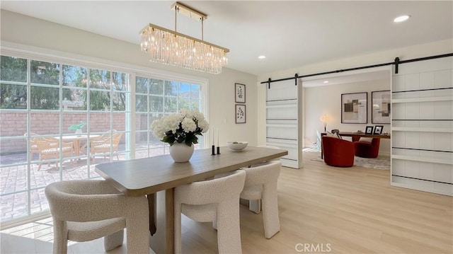 4 Skipper, Irvine, CA 92604 - dining area with a barn door, light wood finished floors, a chandelier, and recessed lighting