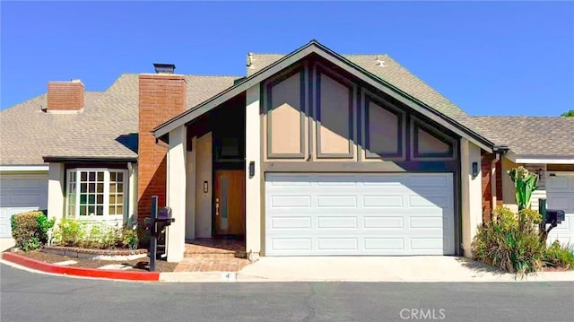 4 Skipper, Irvine, CA 92604 - view of front of house with a garage, a chimney, roof with shingles, concrete driveway, and stucco siding