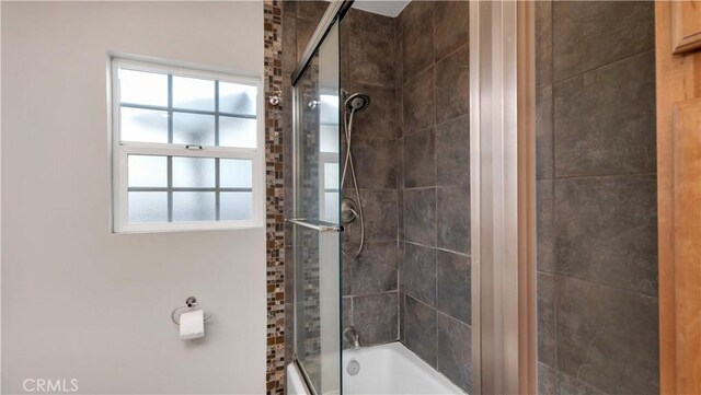 5202 E Conant St, Long Beach, CA 90808 - bathroom featuring combined bath / shower with glass door