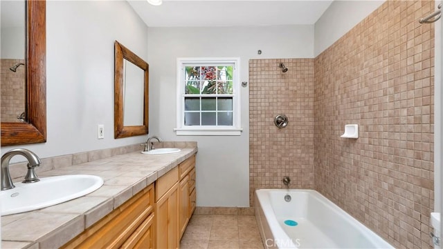 5202 E Conant St, Long Beach, CA 90808 - bathroom featuring tile patterned floors, double vanity, and shower / bath combination