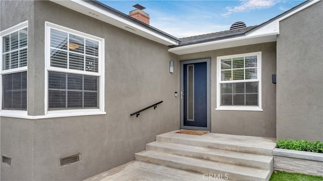 5202 E Conant St, Long Beach, CA 90808 - entrance to property featuring stucco siding and a chimney