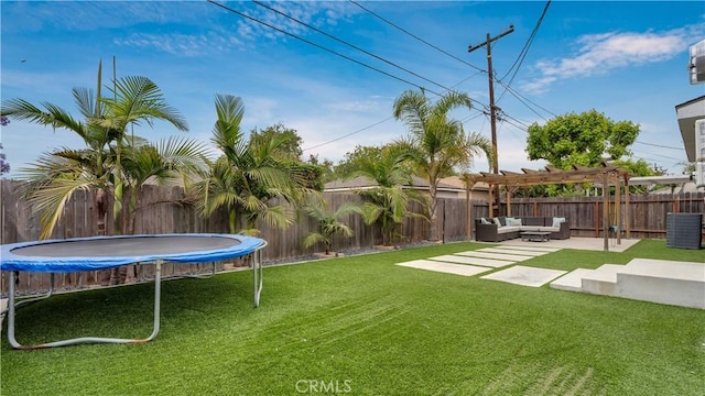 5202 E Conant St, Long Beach, CA 90808 - fenced backyard with a trampoline, outdoor lounge area, a pergola, and a patio area