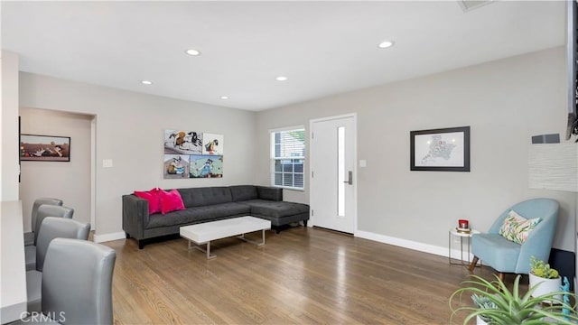 5202 E Conant St, Long Beach, CA 90808 - living area featuring wood finished floors and recessed lighting