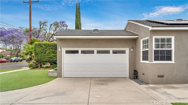 5202 E Conant St, Long Beach, CA 90808 - garage with driveway and solar panels