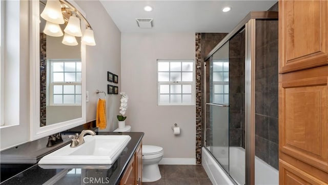 5202 E Conant St, Long Beach, CA 90808 - bathroom with vanity, tile patterned flooring, enclosed tub / shower combo, and recessed lighting