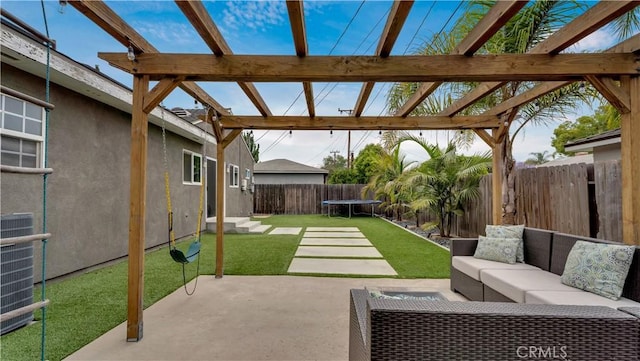 5202 E Conant St, Long Beach, CA 90808 - fenced backyard featuring a trampoline, an outdoor living space, a pergola, and a patio