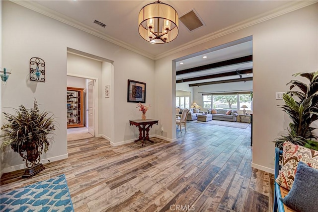 35115 Mahogany Glen Dr, Winchester, CA 92596 - hall featuring wood finished floors, a chandelier, recessed lighting, and ornamental molding
