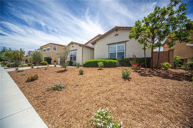 35115 Mahogany Glen Dr, Winchester, CA 92596 - mediterranean / spanish house featuring stucco siding and a tiled roof