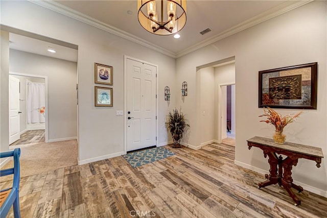 35115 Mahogany Glen Dr, Winchester, CA 92596 - foyer entrance featuring a chandelier, wood finished floors, ornamental molding, and recessed lighting