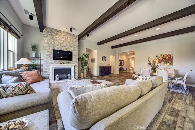 35115 Mahogany Glen Dr, Winchester, CA 92596 - living room featuring beam ceiling, dark wood-style flooring, a stone fireplace, and recessed lighting