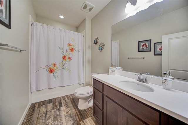 35115 Mahogany Glen Dr, Winchester, CA 92596 - full bath with vanity, wood finished floors, recessed lighting, and shower / tub combo