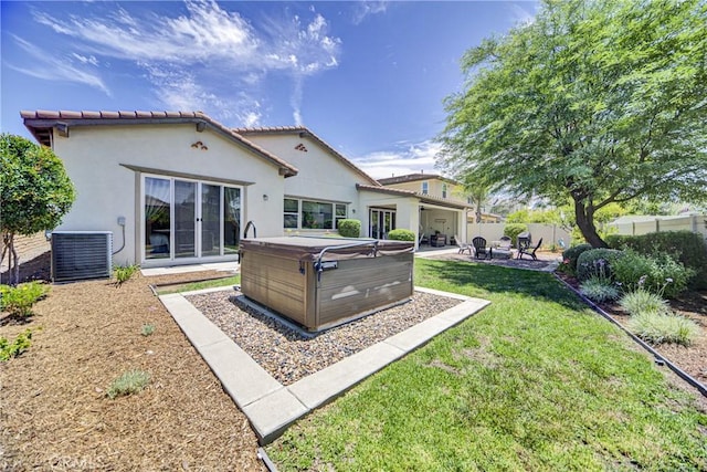 35115 Mahogany Glen Dr, Winchester, CA 92596 - back of house featuring a hot tub, a patio, and stucco siding