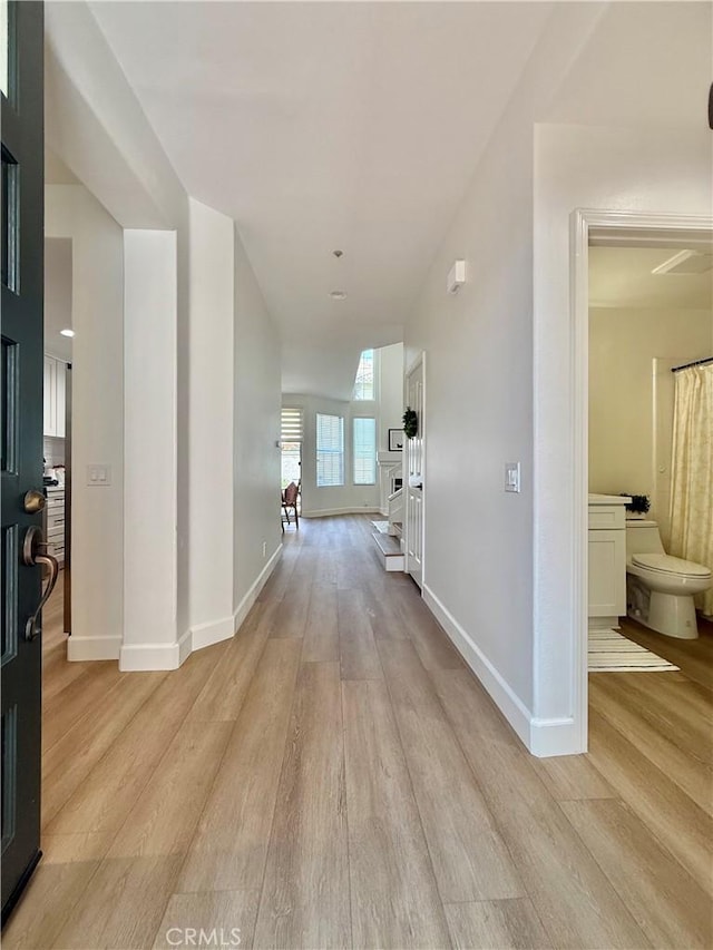 13390 Savanna, Tustin, CA 92782 - corridor with light wood-type flooring and baseboards