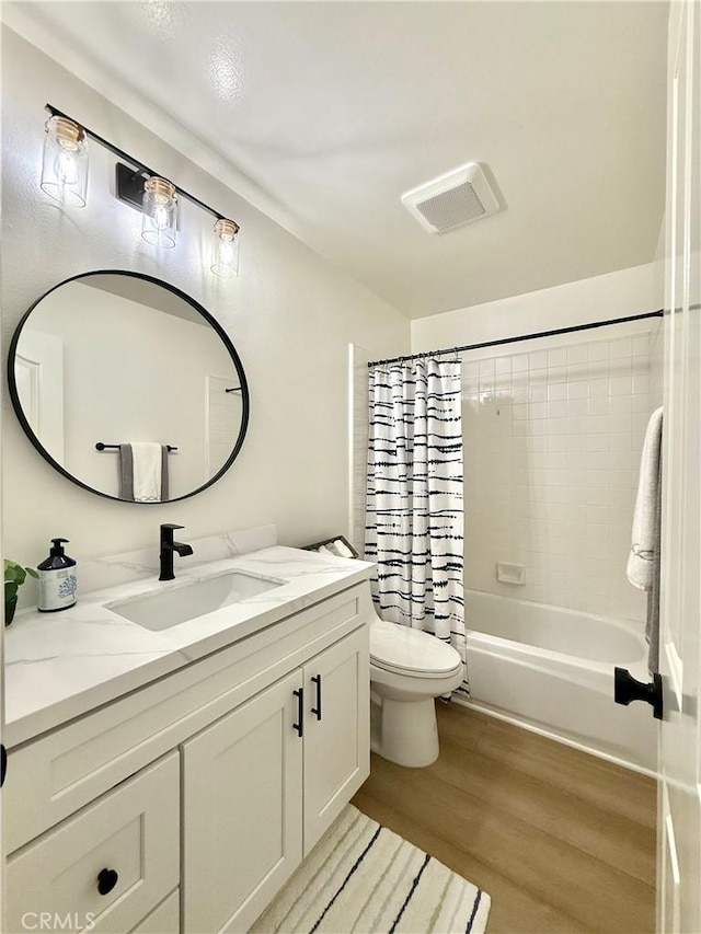 13390 Savanna, Tustin, CA 92782 - bathroom with wood finished floors, vanity, and shower / tub combo