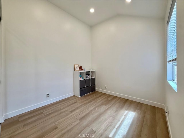 13390 Savanna, Tustin, CA 92782 - empty room with light wood finished floors, recessed lighting, and vaulted ceiling