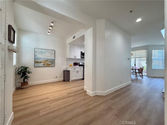 13390 Savanna, Tustin, CA 92782 - hallway with light wood-type flooring and recessed lighting