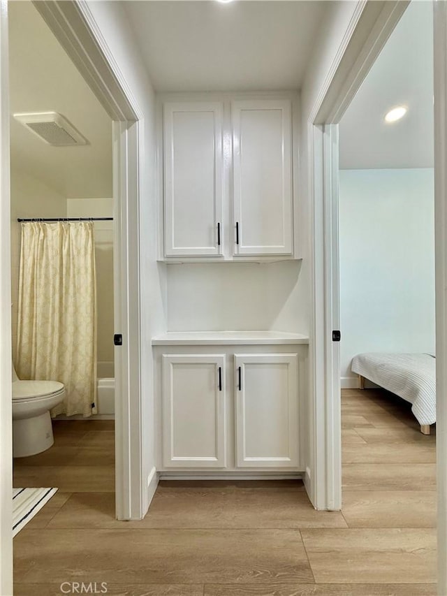 13390 Savanna, Tustin, CA 92782 - detailed view of wood finished floors and recessed lighting