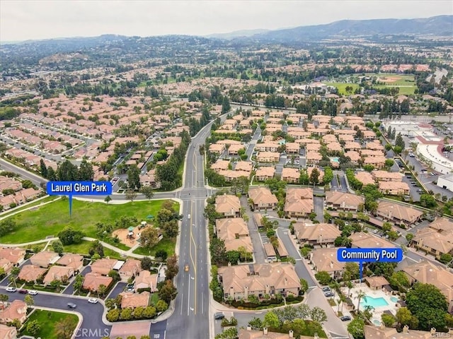 13390 Savanna, Tustin, CA 92782 - aerial view of property's location with nearby suburban area and a mountain backdrop