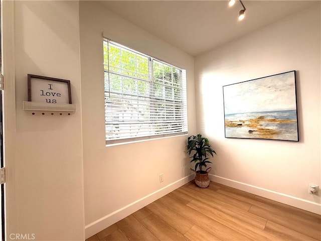 13390 Savanna, Tustin, CA 92782 - unfurnished room with baseboards and light wood-style flooring