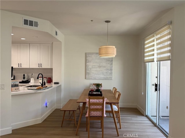 13390 Savanna, Tustin, CA 92782 - dining space featuring light wood-style flooring