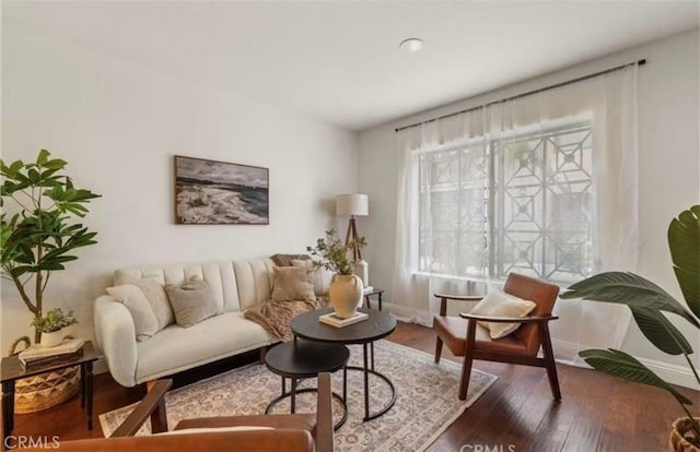225 W 6th St Unit 206, Long Beach, CA 90802 - living room featuring wood finished floors and baseboards