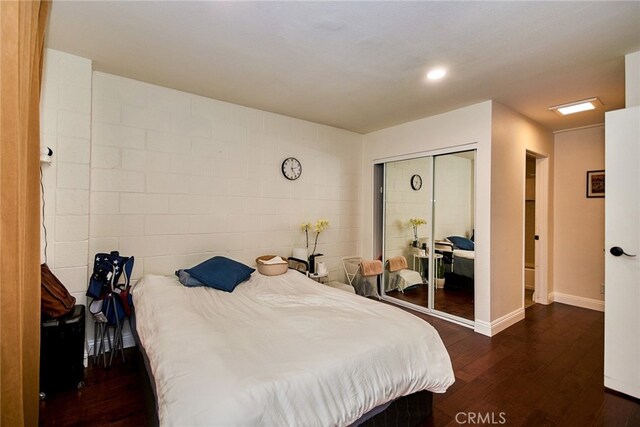 225 W 6th St Unit 206, Long Beach, CA 90802 - bedroom with dark wood-type flooring, a closet, and recessed lighting