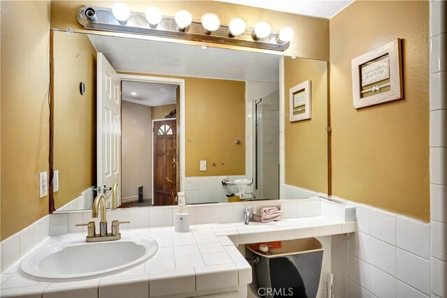 12161 Napoli Dr, Cerritos, CA 90703 - bathroom with vanity and a shower with door