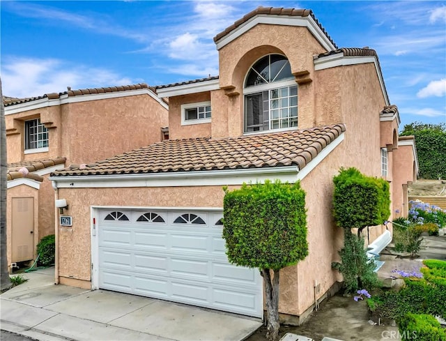 12161 Napoli Dr, Cerritos, CA 90703 - view of front of home featuring driveway, a tile roof, and stucco siding