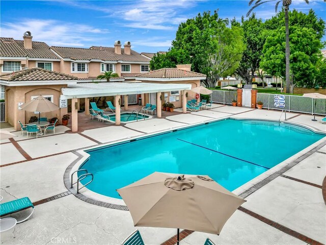 12161 Napoli Dr, Cerritos, CA 90703 - community pool with a patio area and a residential view