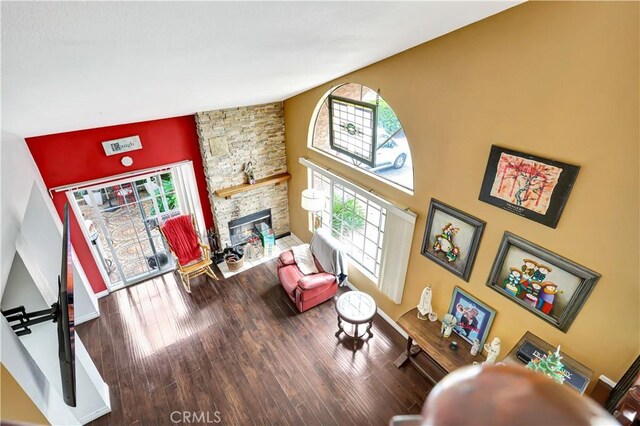 12161 Napoli Dr, Cerritos, CA 90703 - living room with wood finished floors and a stone fireplace