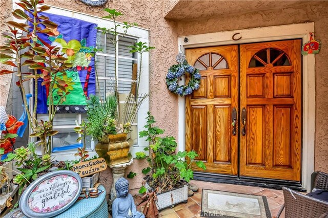 12161 Napoli Dr, Cerritos, CA 90703 - view of exterior entry with stucco siding
