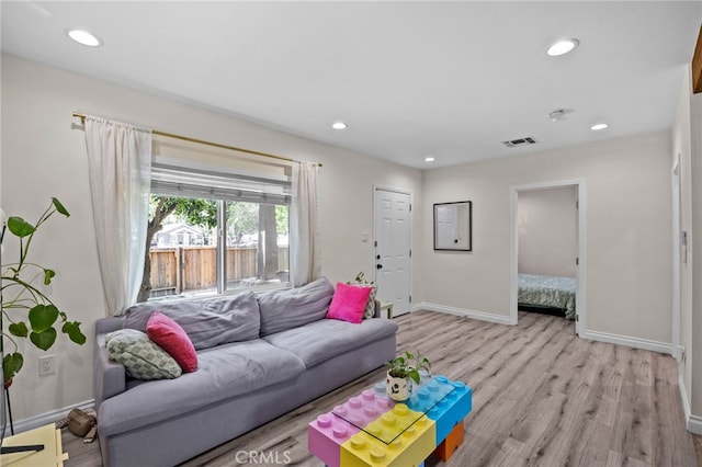 156 W Wabash St, San Bernardino, CA 92405 - living room with light wood finished floors and recessed lighting